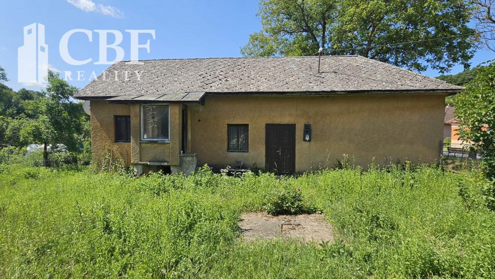 Na predaj dom so stavebným  pozemok  v malebnej obci Ardovo