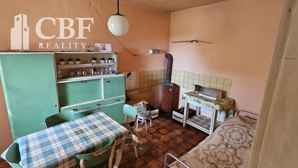 Na predaj dom so stavebným  pozemok  v malebnej obci Ardovo