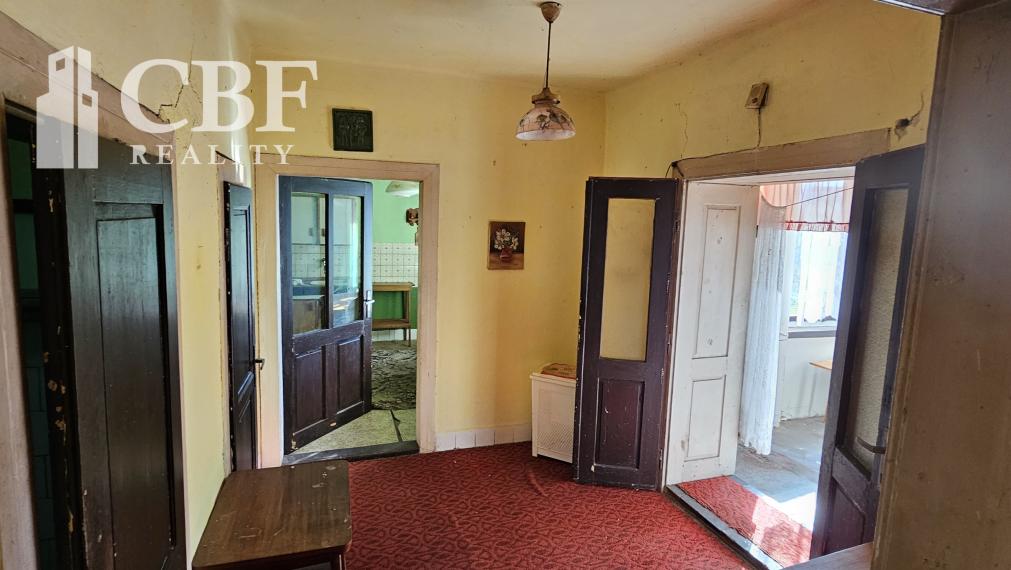 Na predaj dom so stavebným  pozemok  v malebnej obci Ardovo