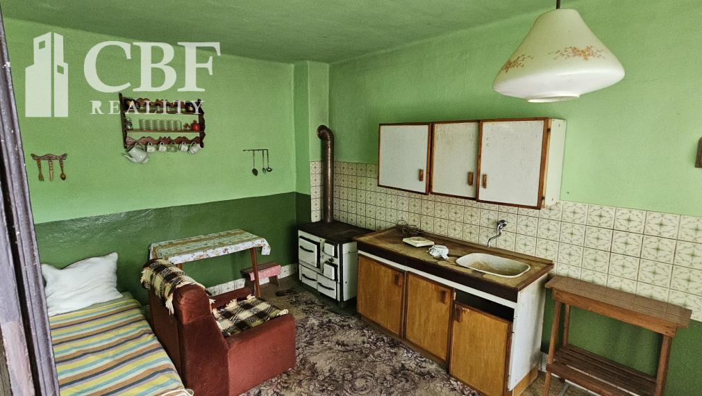 Na predaj dom so stavebným  pozemok  v malebnej obci Ardovo