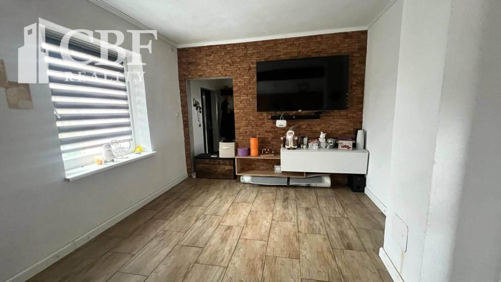 Na predaj 2-podlažný dom so záhradou a garážou v Nadabulej