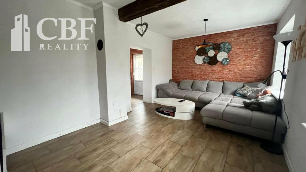 Na predaj 2-podlažný dom so záhradou a garážou v Nadabulej